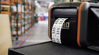 A DuraLabel Toro Max printing labels for warehouse organization.