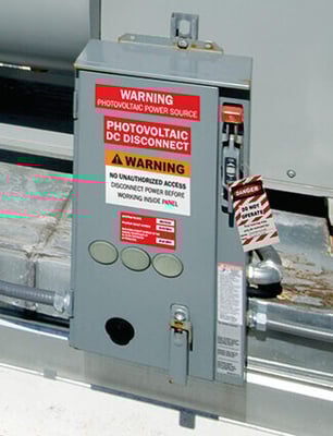 Labels identify energy and electrical sources for safety.