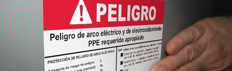 Arc flash hazard label in Spanish